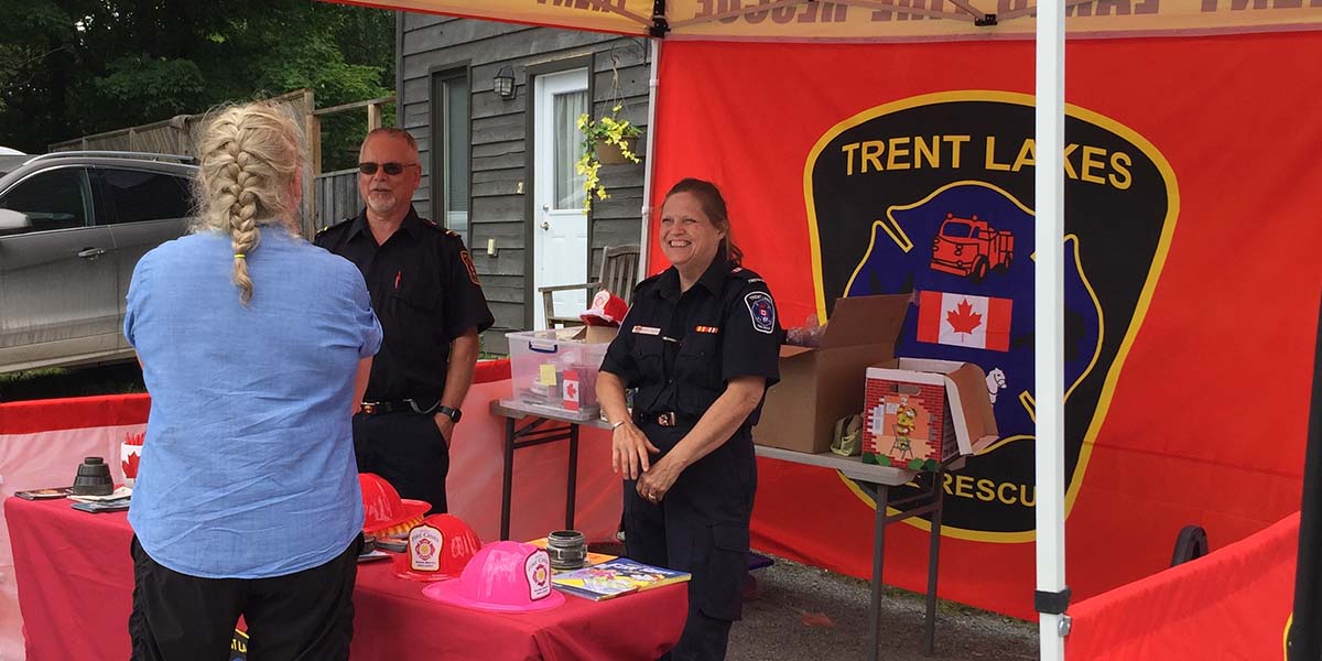firefighters in booth
