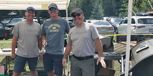 men at bbq